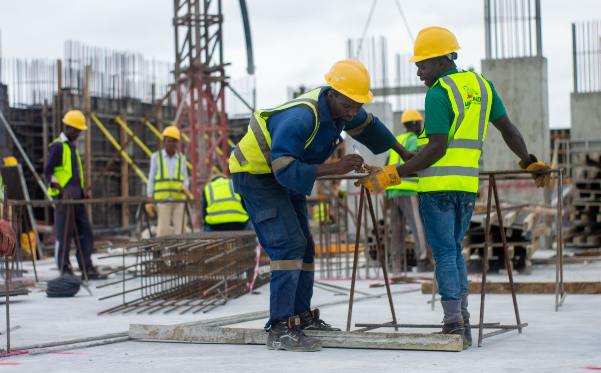 Workers fixing reinforcement bars