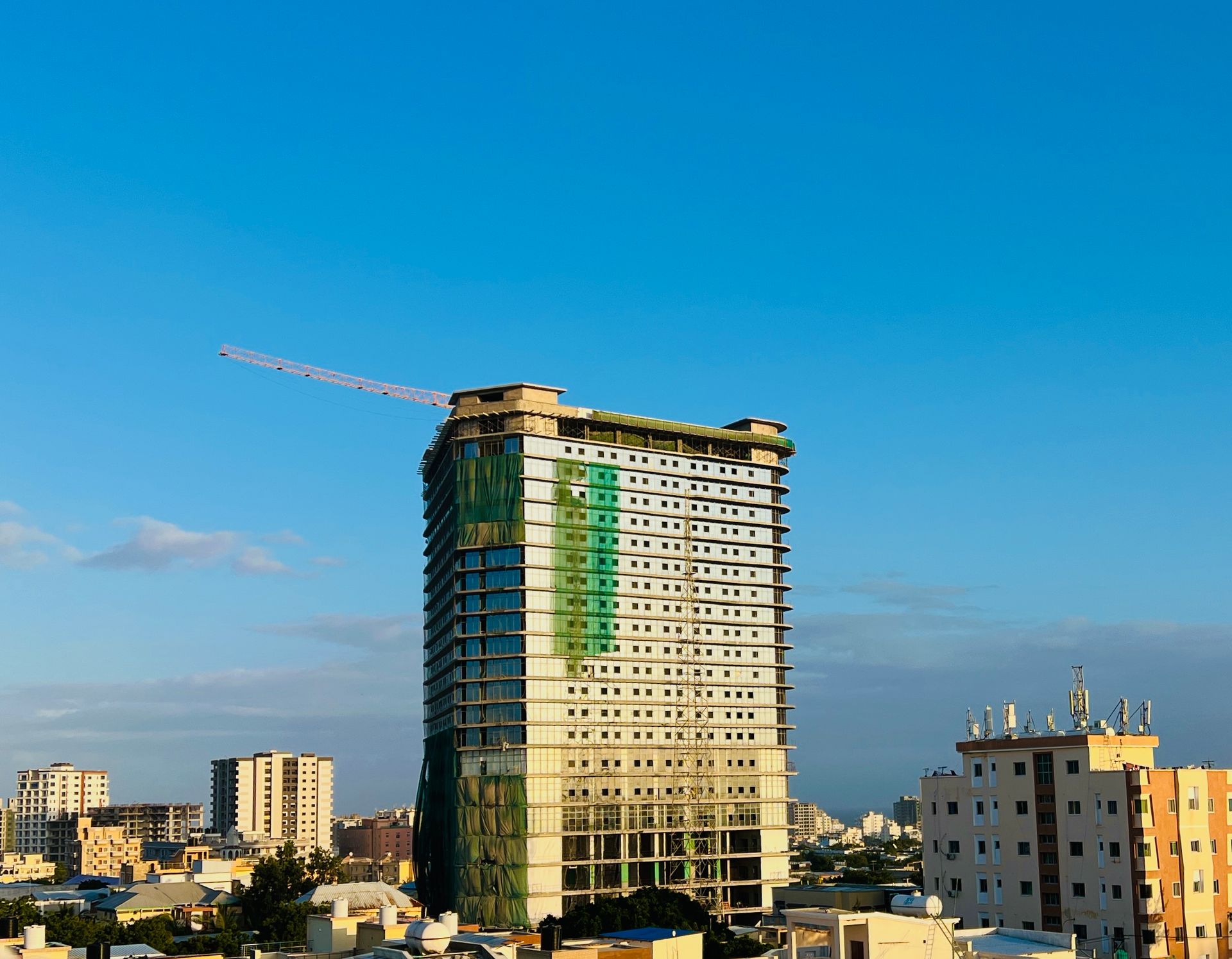 Modern tower block against a blue sky